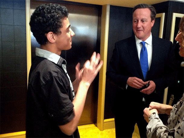 Yusuf with Prime Minister, David Cameron.